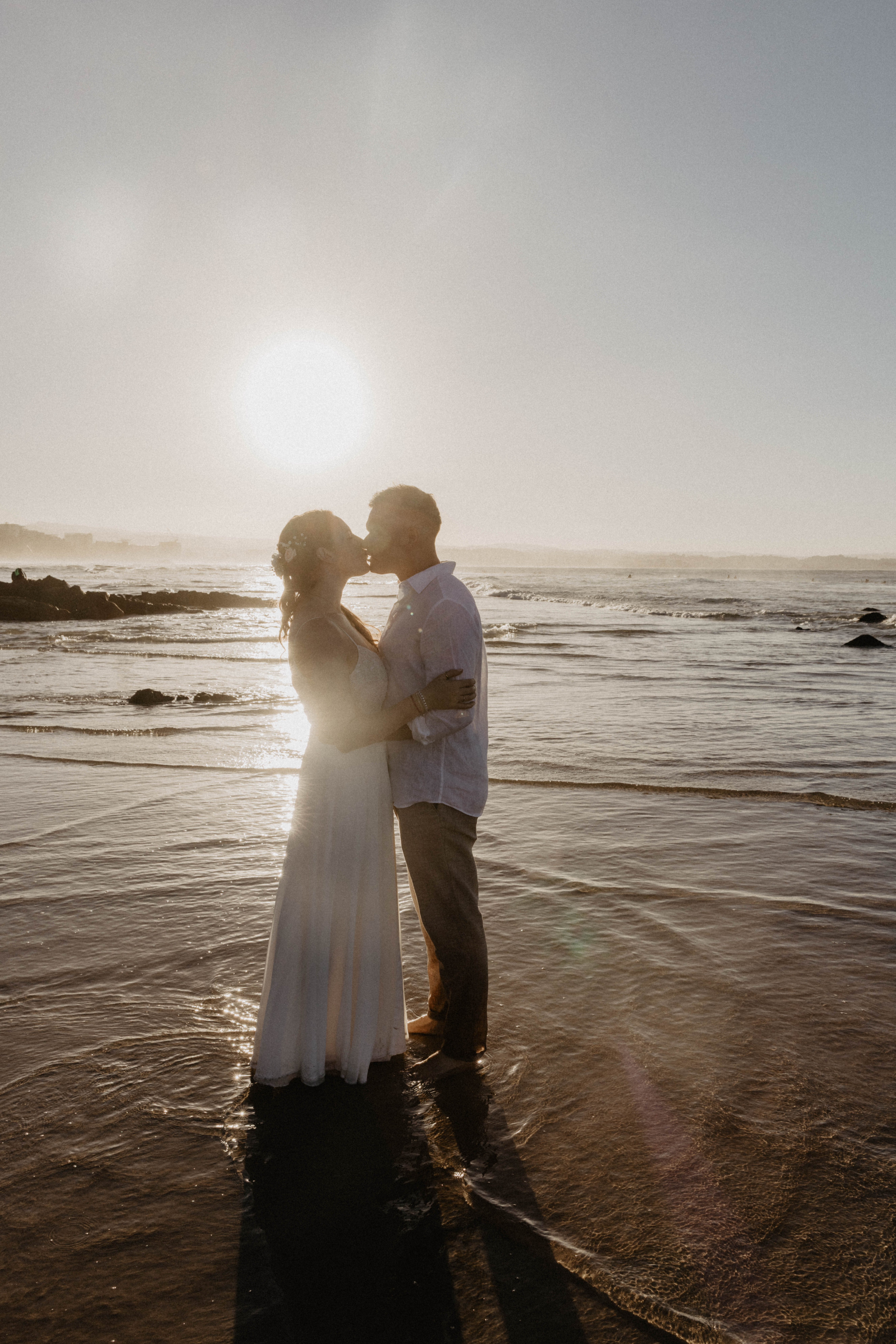 couple portrait golden hour beach wedding